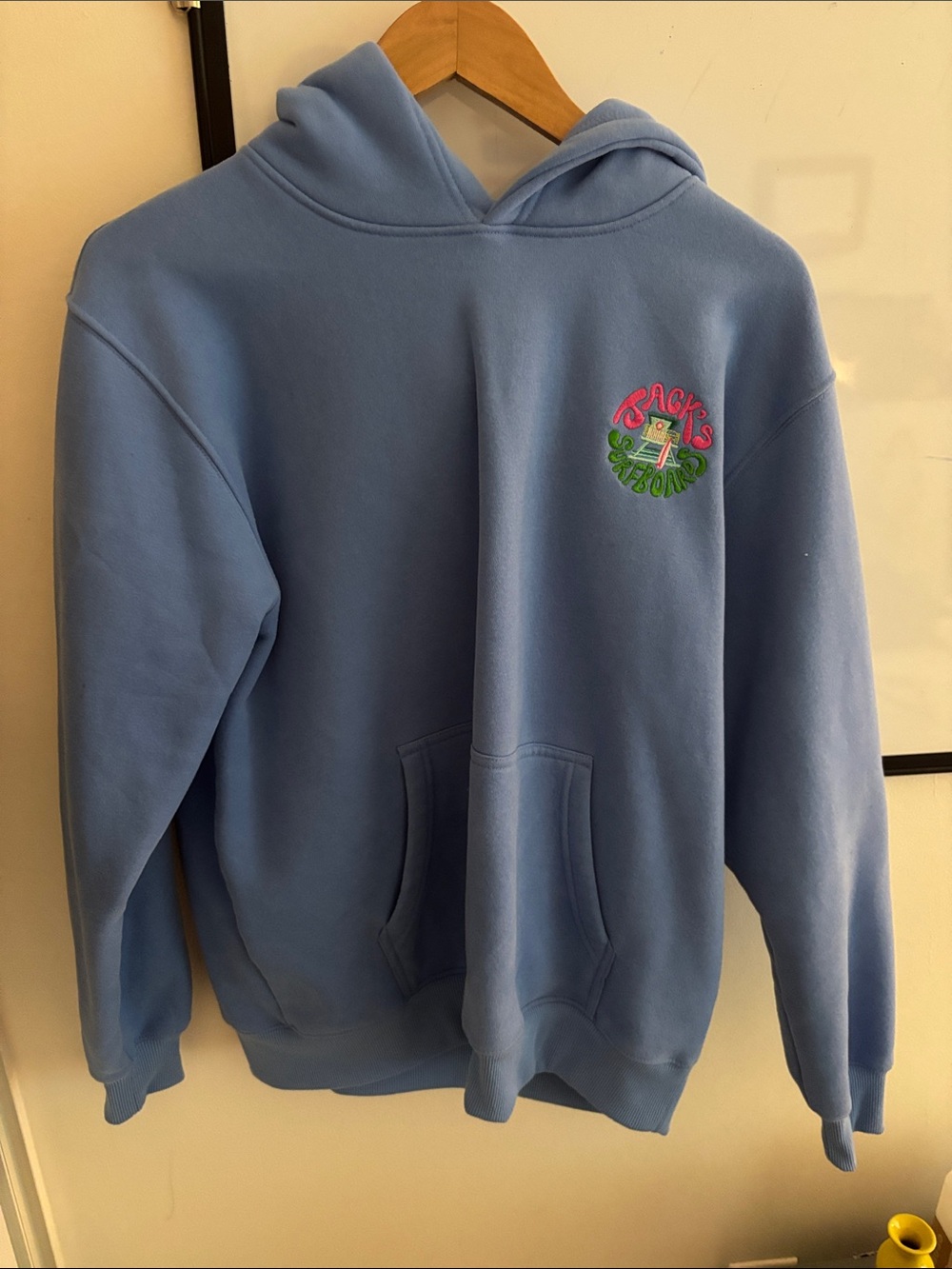 Light Blue Crewneck Hoodie with Small Chest Graphic